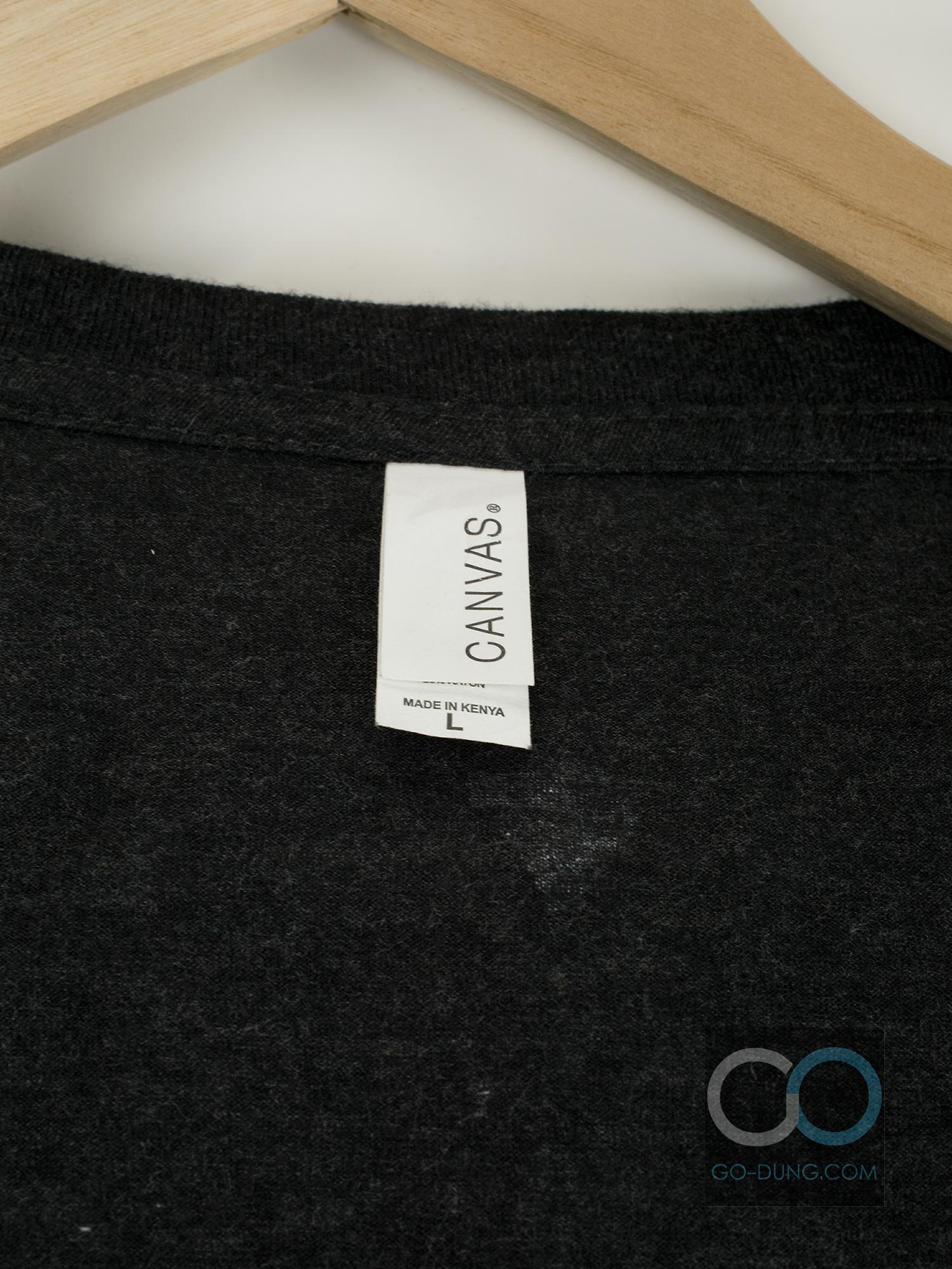 ขาย เสื้อยืดมือสอง ยี่ห้อ CANVAS ผ้า 50 โพลีเอสเตอร์ 25 คอตตอน 25 เรยอน สีเทาเข้ม