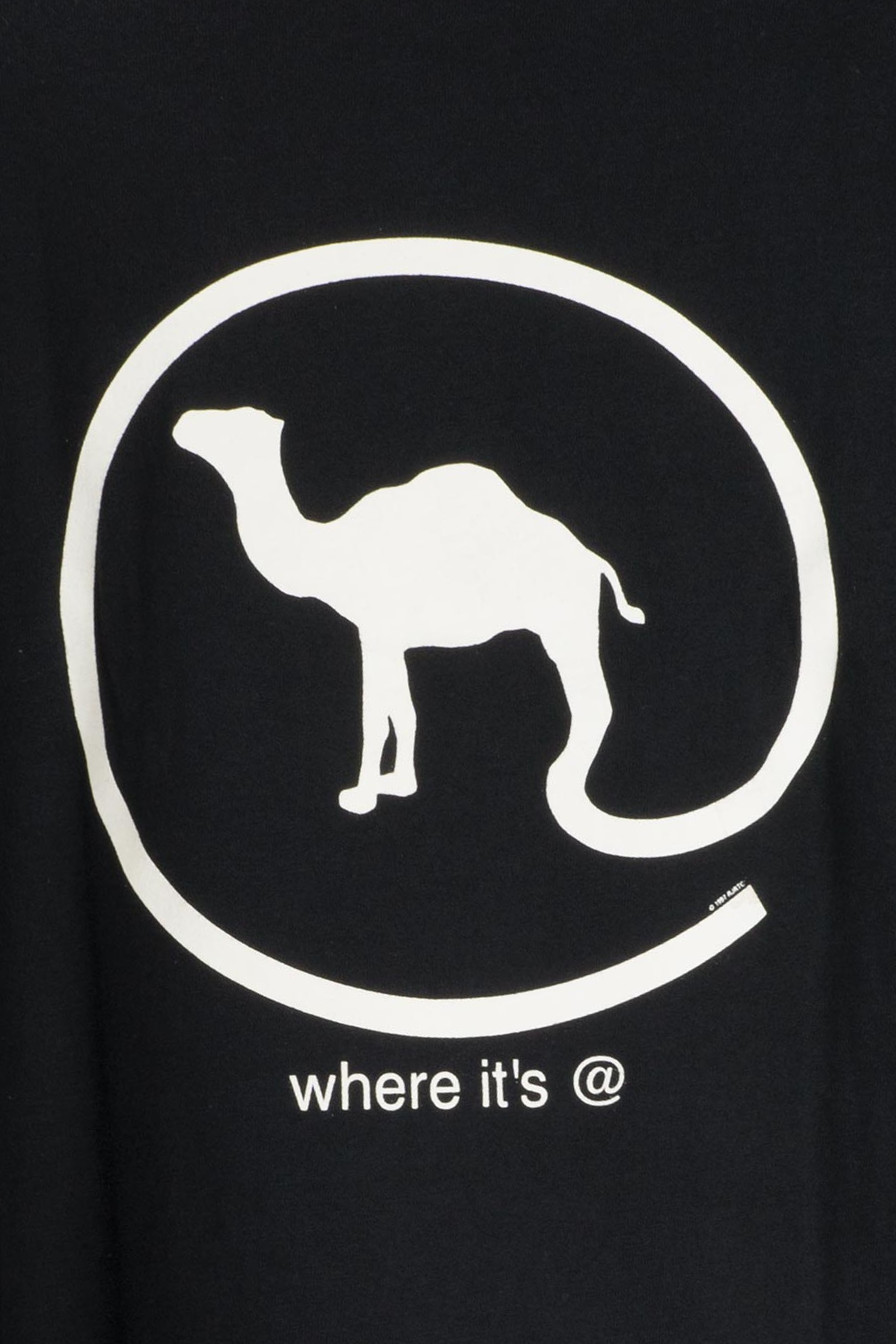 เสื้อยืดมือสอง CAMEL : AMERICAN BORN มีกระเป๋า ผ้า 100 คอตตอน สภาพดีมาก