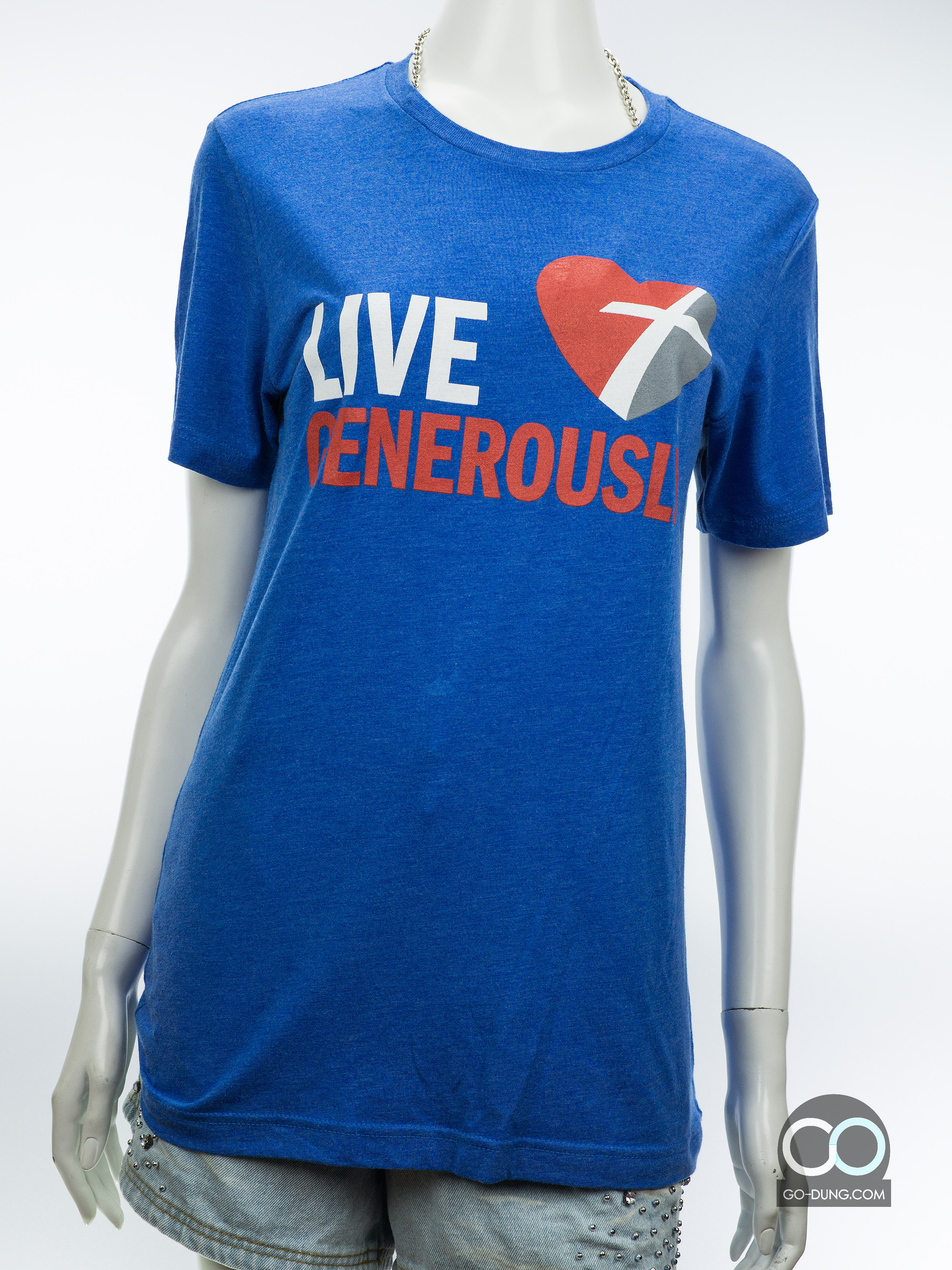 เสื้อยืดมือสอง CANVAS : LIVE GENEROUSL ผ้าผสมเรยอน ผ้าสามเนื้อ 25/50/25 ด้านหลังตรงกลางมีรอยเปื้อนสีขาว